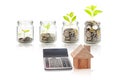 Money growing plant step with deposit coin, seed in clear bottle on white background