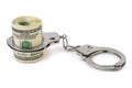 Money and handcuffs Royalty Free Stock Photo