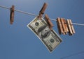 Money Hanging On a Clothesline With Old Wooden Clothespins.