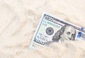 Money hidden in the sand