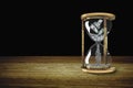 Money in hourglass.Time is precious concept.Three Dimension.