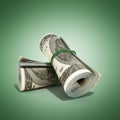 Money hundred dollars bill rol colection 3d render on green