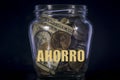 Money jar with AHORRO text