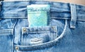 Money in jeans pocket. pounds in your pocket Royalty Free Stock Photo