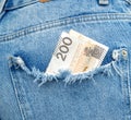 Money in jeans pocket. two hundred zloty bill in a pocket Royalty Free Stock Photo