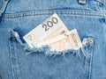 Money in jeans pocket. two hundred zloty bill in a pocket Royalty Free Stock Photo