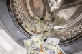 Money laundering. Money cleaning concept. Washing US dollars Royalty Free Stock Photo