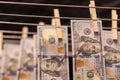 Cash Money laundering on clothesline. Money Laundering US dollars hung out to dry. Royalty Free Stock Photo