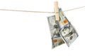 Money laundering. Dollar banknotes hanging on clothesline against white background Royalty Free Stock Photo