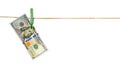 Money laundering. Dollar banknotes hanging on clothesline isolated on white background Royalty Free Stock Photo