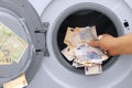 Money laundering illegal cash euros and pounds Royalty Free Stock Photo