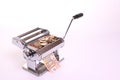 Money-making pasta machine Royalty Free Stock Photo