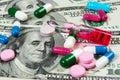 Money and medicine. Medicine pills or capsules, vitamin with money, dollar. Medical or pharmacy prescription for health