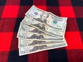 Money on natural wool fabric. Dollars. Many American cash money. Twenty US dollar banknote bills. Royalty Free Stock Photo