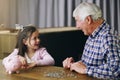 Money, piggy bank and learning with child and grandfather for savings, investment and help. Growth, cash and future with