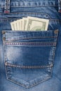 Money in the pocket of jeans Royalty Free Stock Photo