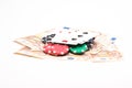 Money with poker chips and cards Royalty Free Stock Photo