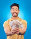 Money, portrait and young man or winner with bonus, financial success and winning, cashback prize or lottery. Happy Royalty Free Stock Photo