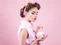 Money. Pretty girl in vintage style with moneybox. Moneybox financial investment. Woman investor portrait. Lost money.