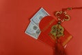 Money in red envelopes Chinese new year greeting gift, closed up of US dollar banknotes in red traditional envelopes Royalty Free Stock Photo