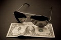 Money reflection in a sunglasses