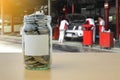 Money saving for Car payment in the glass bottle Royalty Free Stock Photo