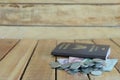 Money saving concept for vacation with coins stack, and passport on the wooden backgrounds. Royalty Free Stock Photo
