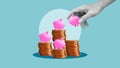 Money saving tips are shown using Piggy banks on stacks of coins. Make a savings plan and more money Royalty Free Stock Photo