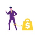 Money slavery concept. Business man chained to money weight with shackles.