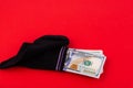 A money sock, a bundle of American hundred dollar bills hidden in a sock. Savings and storage concept. Copy space Royalty Free Stock Photo