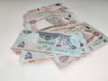 Money Spread on a white table | UAE Dirhams | United Arab Emirates currency | AED - Dhs | hundred bills