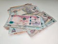 Money Spread on a white table | UAE Dirhams | United Arab Emirates currency | AED - Dhs | hundred bills