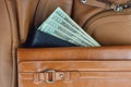 Money between stack of purses Royalty Free Stock Photo