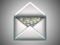 Money transfer - US dollars in opened envelope