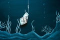 Money trap concept. US 100 dollar bill as a bait. American currency on the hook. Investment risk, business fraud and Royalty Free Stock Photo