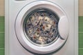 money in washing machine close up