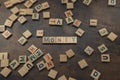 Money word made of scattered wooden alphabet letters - conceptual message