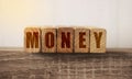 Money word written on wooden blocks. Financial business assets value concept Royalty Free Stock Photo