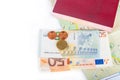 Money & x28;Euro& x29;, passport and map on a white background. Space for