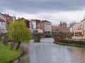 River Cabe as it passes through the city of Monforte de Lemos under a Roman stone bridge