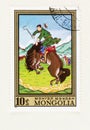 Mongol Man breaking a Horse