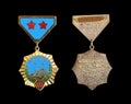 Mongolia - CIRCA 1975: Medal `30 years of victory over militaristic Japan`, isolated on black background