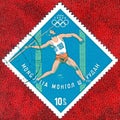 Postage stamp printed in Mongolia with a picture of a javelin-throwing, with the inscription `Tokyo, 1964`