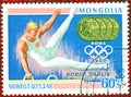 Postage stamp printed in Mongolia with a picture of Seven-time Olympic champion Boris Shahlin gymnastics