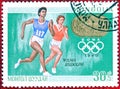 Postage stamp printed in Mongolia with a picture Triple champion of Wilma Rudolph Athletics, from the series `Olympic champion`