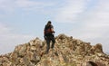 Mongolia - July 21 2019: tourist walking with backpack on beautiful landscape. Consept of healthy active lifestyle