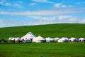 The mongolia yurts on the green hillside Royalty Free Stock Photo