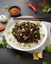 Mongolian beef stewed in dark soy sauce with spices. Asian style food Royalty Free Stock Photo