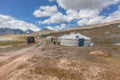 Mongolian dwelling on the green plain of grass Royalty Free Stock Photo