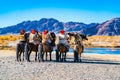 Mongolian Eagle Hunter waiting at the river Royalty Free Stock Photo